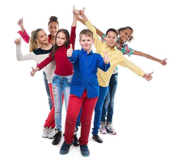 istock classmates standing  with their hands and thumbs up 505498702