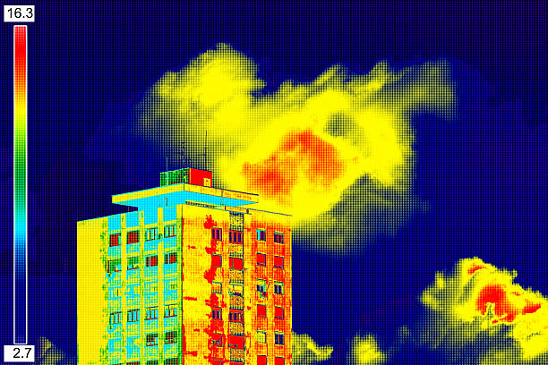 Thermal image on Residential building Infrared thermovision image showing lack of thermal insulation on Residential building thermal image stock pictures, royalty-free photos & images