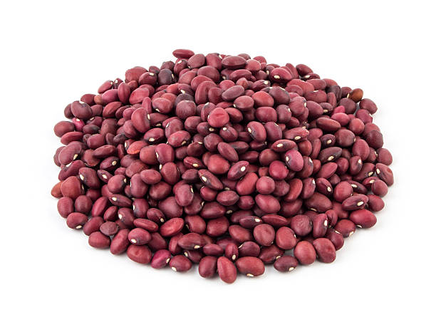 red beans isolated on white background Dry red beans isolated on white background kidney bean stock pictures, royalty-free photos & images