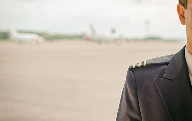 istock Pilot on the airfield. Place for your text. 505500425