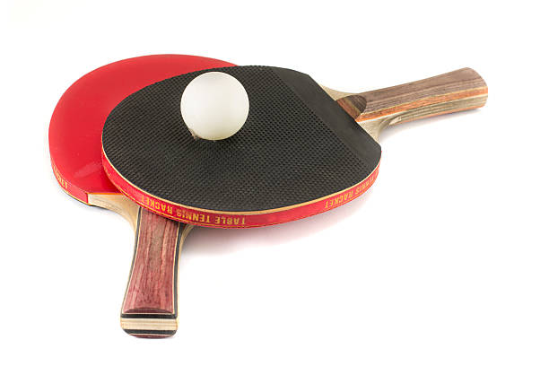 istock Two table tennis rackets and a ball isolated 505500578