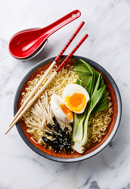 istock Asian noodles with egg, enoki and pak choi cabbage 505500864