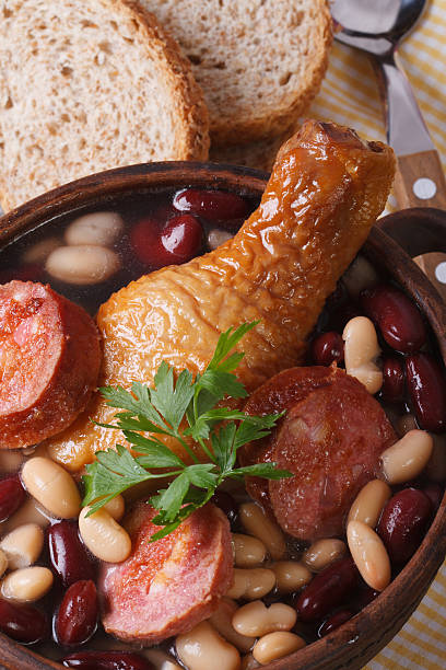 istock kidney beans with chicken and grilled sausages vertical top view 505500889