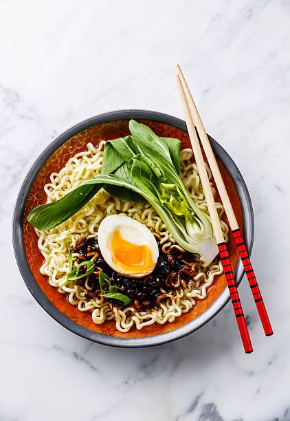 istock Asian noodles with egg and pak choi cabbage 505500900