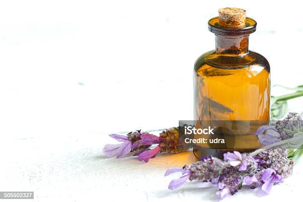 Lavender Oil On White Planks Stock Photo - Download Image Now - Alternative Medicine, Alternative Therapy, Aromatherapy