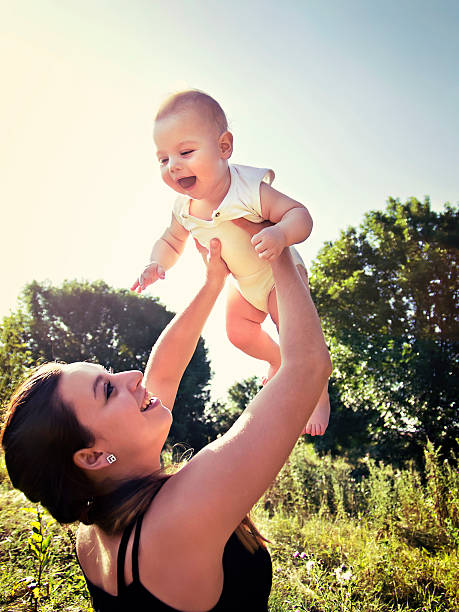 istock mother picks up the child in her arms 505502921