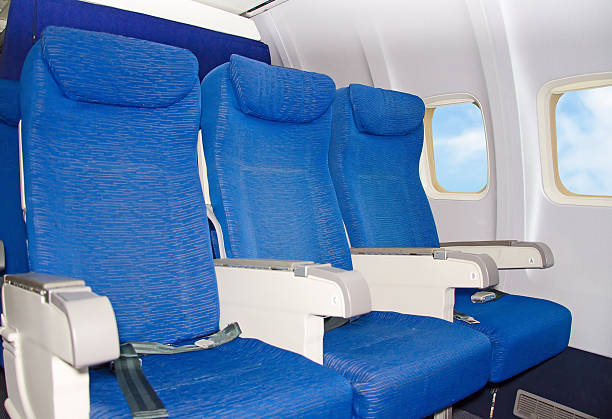 istock Empty airplane seats near the window. 505504183