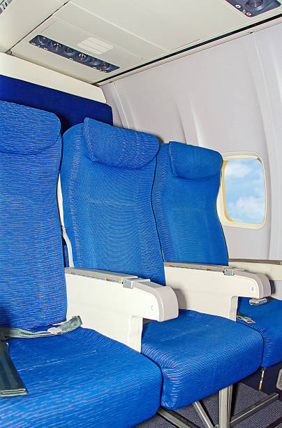 istock Empty airplane seats near the window. 505504193