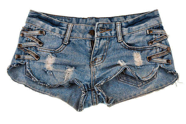 istock Old worn jean shorts isolated on white 505505213