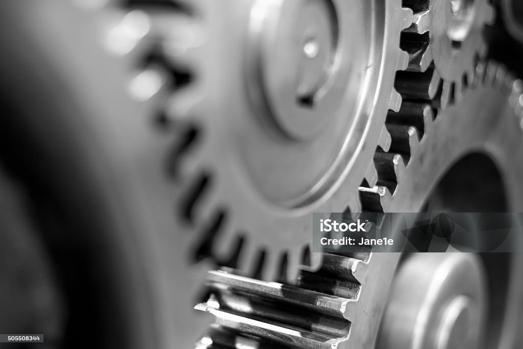 Greasy gears in the machine. Big greasy gears in the old machine. Gear - Mechanism Stock Photo