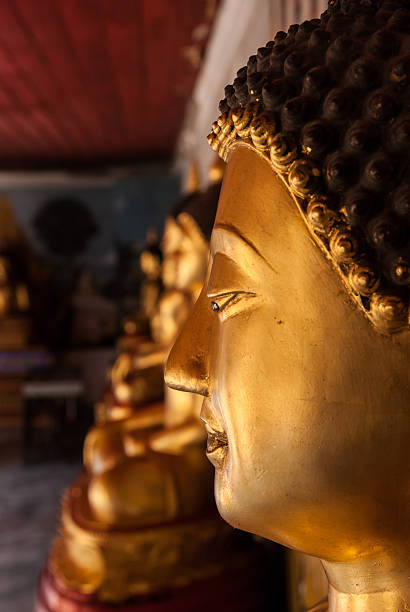istock close-up face of Buddha image 505510186
