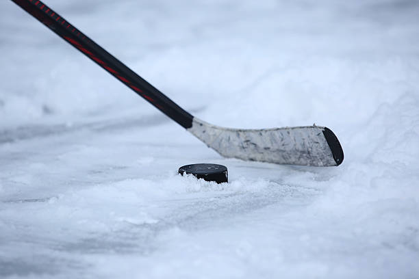 istock Hockey Stick and Puck 505510194