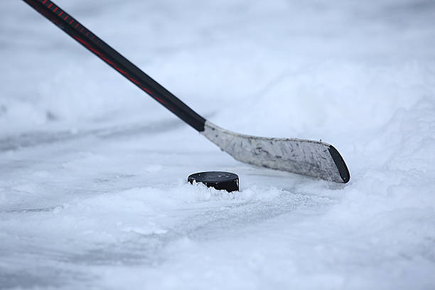 istock Hockey Stick and Puck 505510234