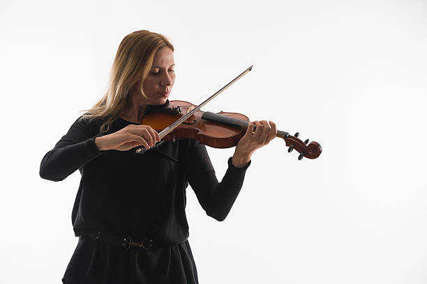 istock Young woman violinist player during presentation 505510278