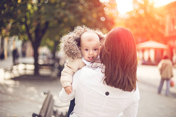 istock Happy baby in mothers hands 505510656