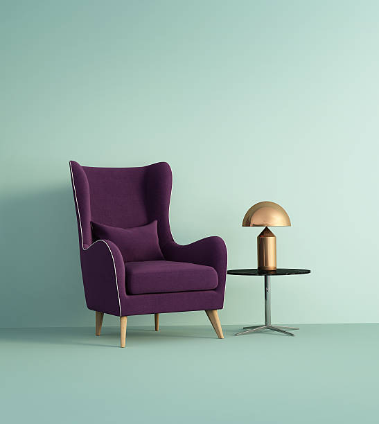 violet sessel über zartes grüne wand - furniture design indoors armchair stock-fotos und bilder