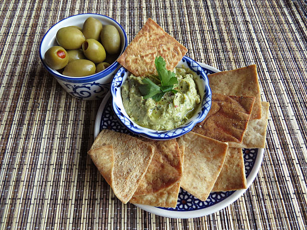 istock Snacks with olives and hummus 505512572