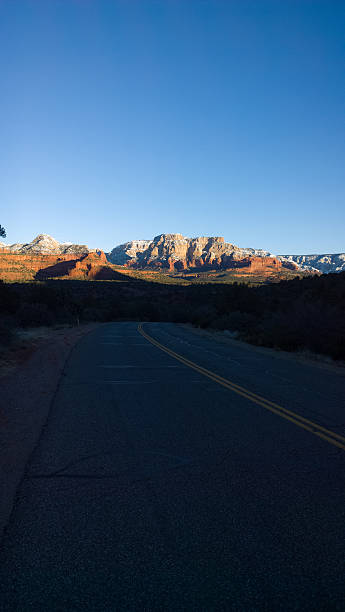 istock Road to Snowy Red Rocks - Vertical 505512792