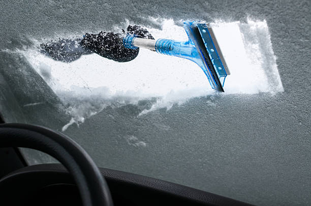 istock Cleaning Car From Snow 505513164