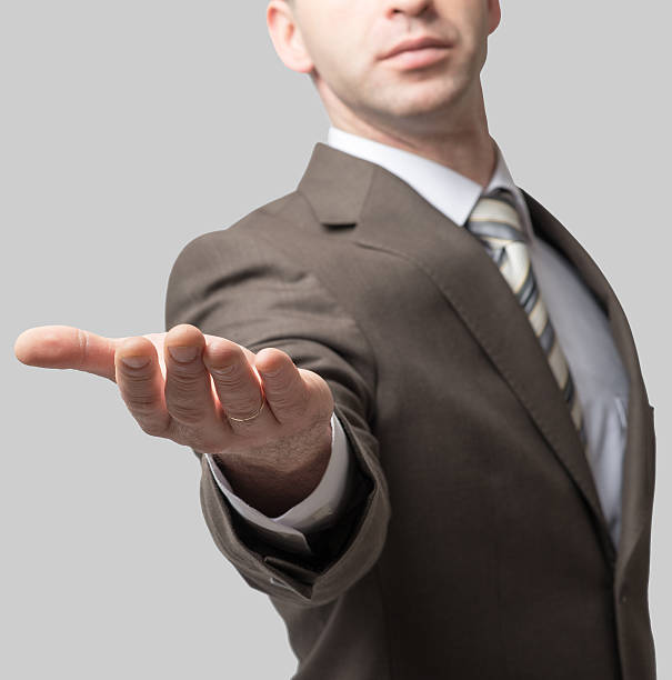 istock Businessman with outstretched hand 505513554