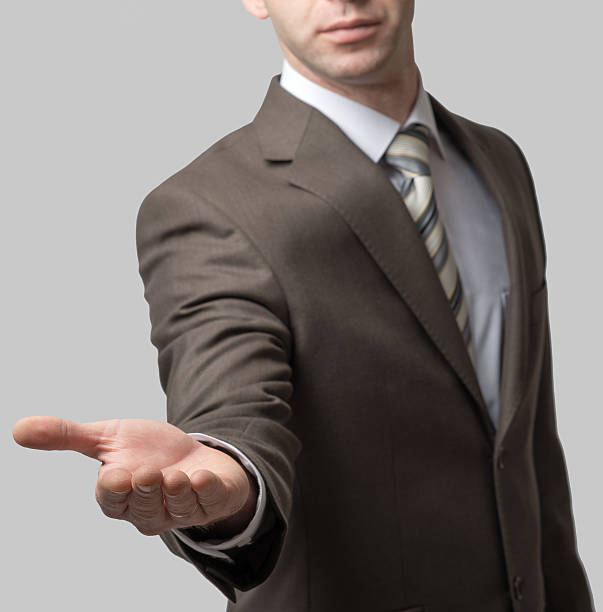 istock Businessman with outstretched hand 505513576