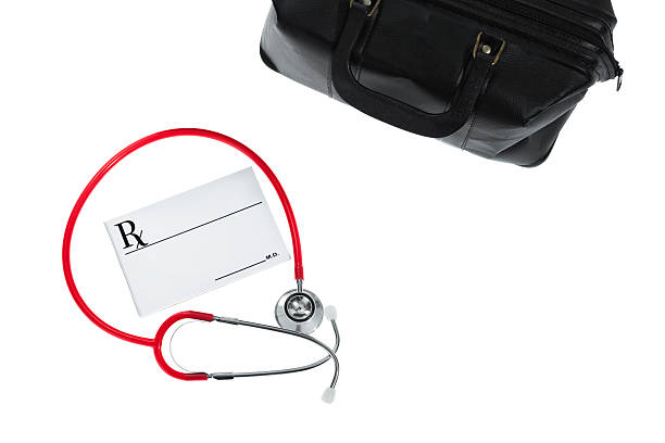 istock Stethoscope, RX pad and Doctor's bag on a white background 505513710