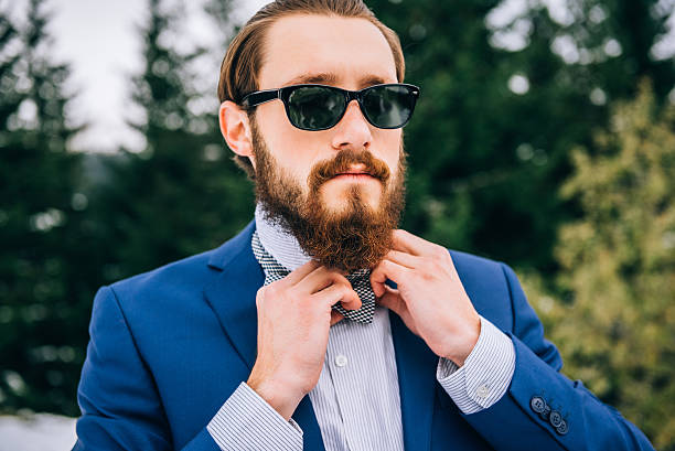 istock groom in a blue suit in the mountains Carpathians 505513968