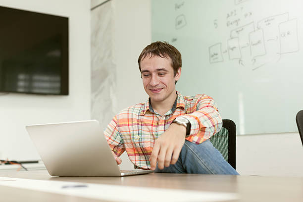 istock Businessman working laptop sitting office desk 505515234