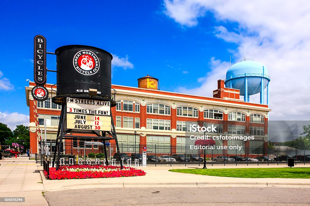The old railway water tower in Fargo, North Dakota Fargo, ND, USA - July 24, 2015: The old railway water tower advertising the Great Northern Bicycle Co in front the Fargo-Moorhead complex in downtown Fargo N. Dakota Fargo - North Dakota Stock Photo