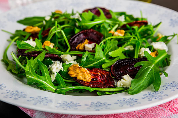 istock Raw green beet and arugula salad with blue cheese 505515964