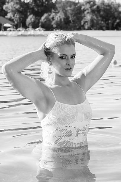 istock pretty girl in water 505516842
