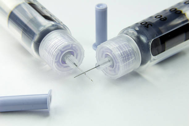 istock modern syringes and needles to inject insulin for diabetes 505517321