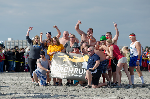 Wildwood, NJ, USA - January 16, 2015; Plungers pose for an pre-plunge picture ahead of the annual Polar Plunge charity event on the beach of Wildwood, NJ. During the annual fundraiser over 1.100 participants made a dash into the chilly Atlantic Ocean to raise funds for Special Olympics New Jersey. 