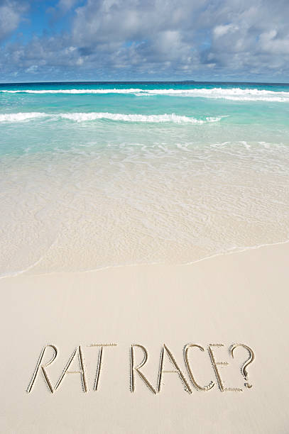 istock Rat Race Message on Bright Tropical Beach 505519445