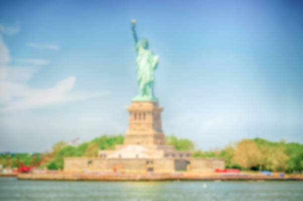 istock Defocused background with the Statue of Liberty, NYC 505520358