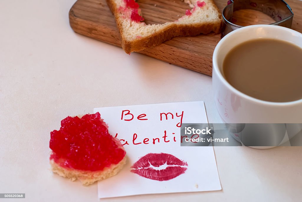 cup of black coffee with milk, toast and jam Be my Valentine, a cup of black coffee with milk, toast and jam, breakfast on Valentine's Day Black Coffee Stock Photo