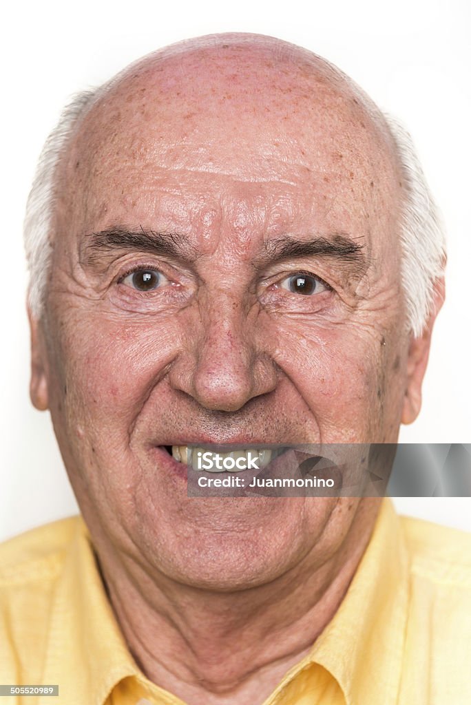 Smiling Senior Headshot of a smiling caucasian senior man looking at the camera 70-79 Years Stock Photo