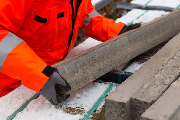 istock Male builder working at house site in UK 505521618