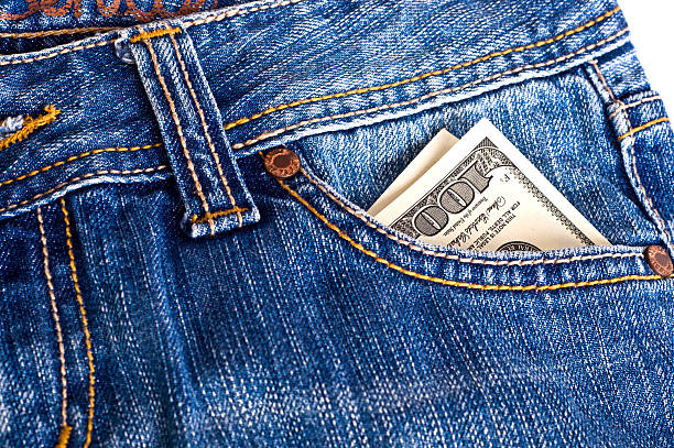 Dollars in pocket stock photo