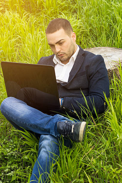 istock Young businessman working on a laptop 505523129