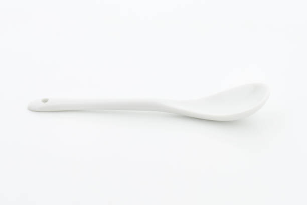 istock White porcelain spoon 505524560