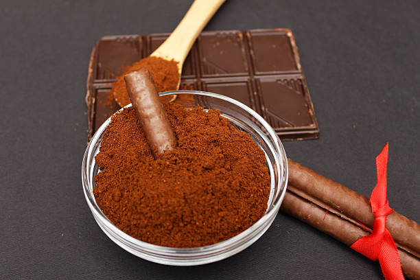 istock Ground coffee and fresh coffee on wooden spoon 505525386