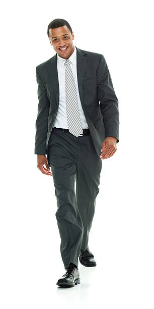 istock Cheerful businessman walking 505526632