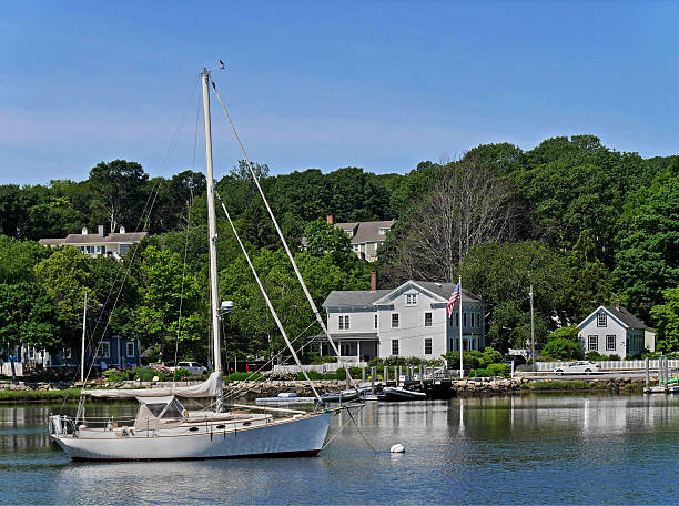 istock sailboat and waterfront houses 505527164