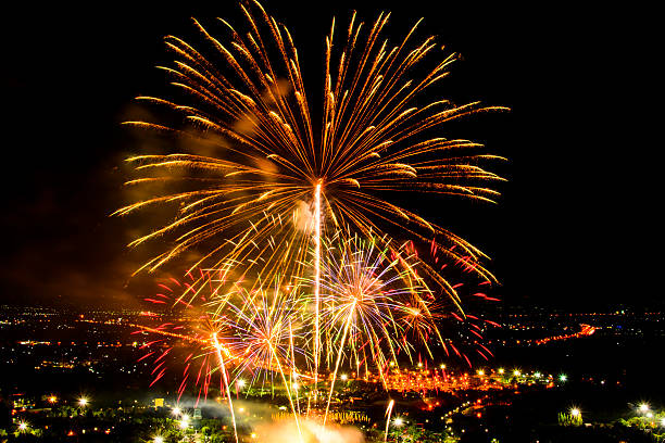 istock Fireworks on night city background 505528530