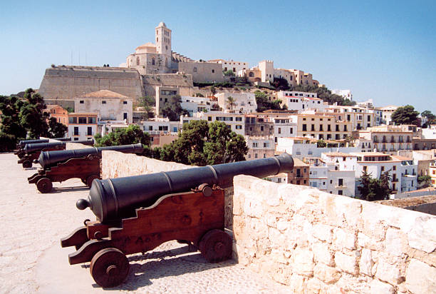 Ibiza / Eivissa, Balearic Islands, Spain: Ibiza town skyline, church and citadel above the residential area - photo by M.Torres