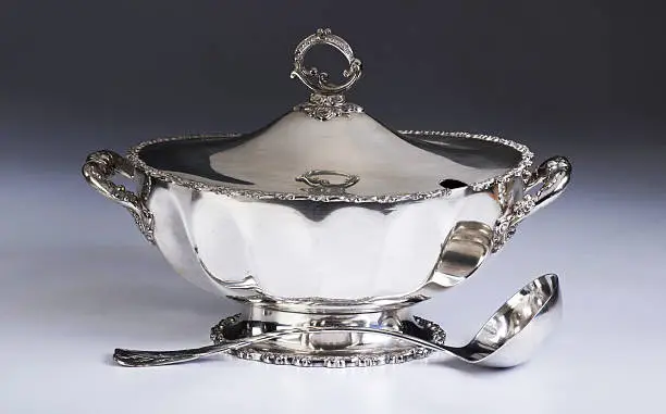 19th century English silver soup tureen and silver ladle.
