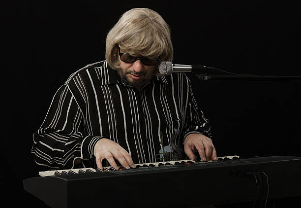 istock Musician improvising with digital piano 505533337