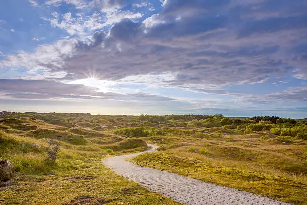 Trail winding through Dunes on the island of Baltrum,just a trail for walking, for being in that landscape