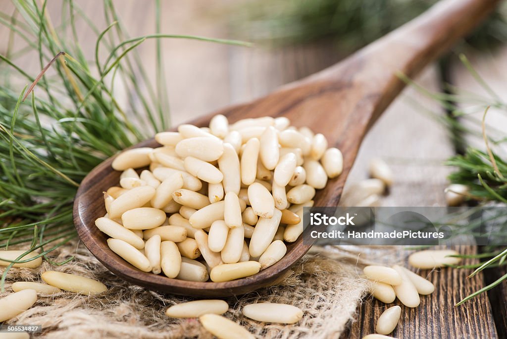 Small portion of Pine Nuts Small portion of Pine Nuts as detailed close-up shot Close-up Stock Photo